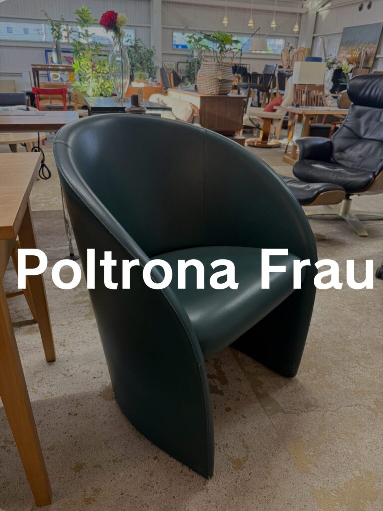 Poltrona Frau（ポルトローナ・フラウ） Intervista（インターヴィスタ）ラウンジチェア　包み込む曲線アームと低重心設計のモダンソファ、レザー張りで滑らかな質感と上質な仕上げが特徴
