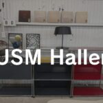USM Haller（ユーエスエム ハラー） シェルフ3台 ディスプレイ用 構成の違いが収納・ディスプレイ・アクセントの役割を分担し、色と高さの対比が空間にリズムを生む。